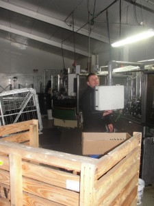 Steklenice v "disgorger"-ju